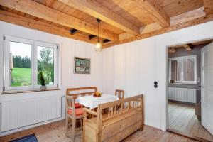 a dining room with a table and chairs at Salerhof in Bad Wurzach