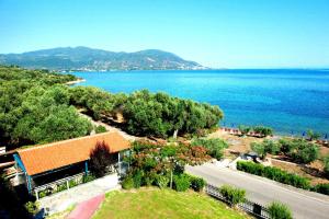 an aerial view of a house and the ocean at Effie's House in Agios Nikolaos
