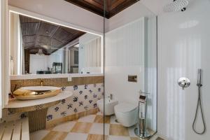 a bathroom with a sink and a toilet at W430 Guimarães in Guimarães +73 photos