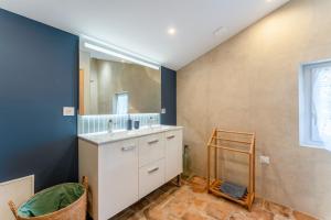 a bathroom with a sink and a mirror at Mas Saint Louis in Avignon +69 photos