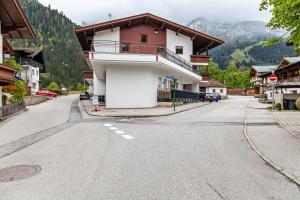a building on the side of a street at Ferienwohnung Brandbergblick in Mayrhofen