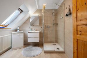 a bathroom with a shower and a sink at Haus Hachmann Wesselburen in Wesselburen +40 photos