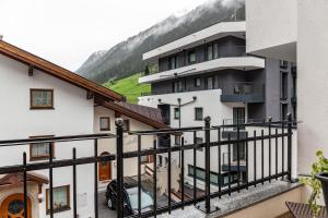 a view from the balcony of a apartment building at Alpenflora 1 in Ischgl