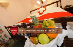 A bed or beds in a room at Hotel Walliserhof - The Dom Collection