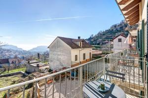 a view from a balcony of a house at Coast 2 Coast in Agerola