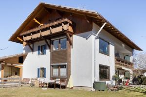 a house being remodeled with a wooden roof at Haus Bergliebe in Pfronten