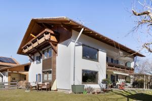 a house being constructed with a gambrel roof at Haus Bergliebe in Pfronten +48 photos