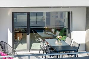 a dining room with a table and chairs at Purer Genuss - Exklusive in Owingen