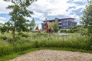 a house under construction in a field of grass at Schmuckstückchen in Hilzingen