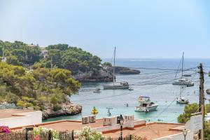 a view of a harbor with boats in the water at Apartamento Ola de Mar in Felanitx