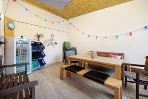 a dining room with a table and chairs at Wasgauaktiv in Schindhard +27 photos