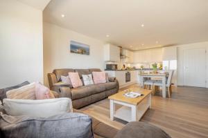 a living room with a couch and a table at 2 Bed in Tintagel oc-m37507 in Tintagel