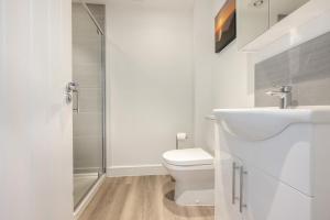 a white bathroom with a toilet and a shower at 2 Bed in Tintagel oc-m37507 in Tintagel +17 photos