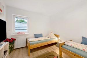 a living room with a couch and a window at Fewo Weber in Sankt Ingbert