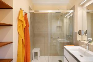 a bathroom with a shower and a sink at Casa Inti in Tijarafe +15 photos