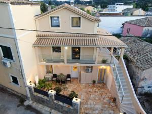 an aerial view of a house with a patio at Seawind Gouvia in Corfu