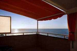 a view of the ocean from the balcony of a house at Vista Al Paraíso in El Pris
