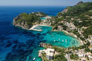 an aerial view of a beach with turquoise water at Arianna Studio Ground Floor 3 in Paleokastritsa