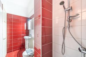 a bathroom with a shower and a toilet at Arianna Studio Ground Floor 3 in Paleokastritsa +16 photos