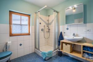 a bathroom with a shower and a sink at Ziegelhof in Schuttertal +41 photos