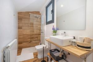 a bathroom with a sink and a shower at Cantó el Sech in Montoliu de Segarra +24 photos