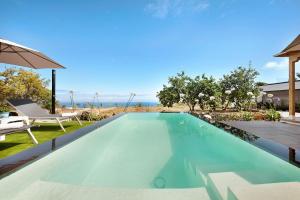 a swimming pool in the backyard of a house at Casa Adayeim 1 in Icod de los Vinos