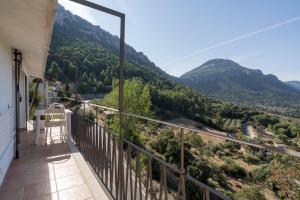 a balcony with a view of the mountains at Casa Su Craminu in Dorgali