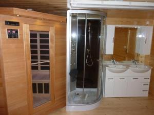 a bathroom with a shower and a sink at Chalet Bellevue in Les Orres +13 photos