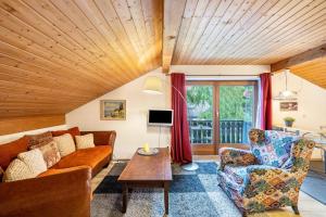 Et tv og/eller underholdning på Ferienwohnung Freudenthal Bernried