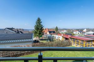 a view of a city with houses and solar panels at Appartement Irmi in Ihrlerstein