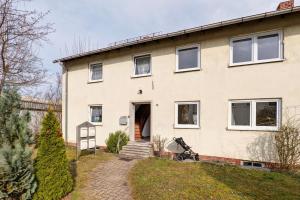 an image of a house with a garden at Yellow in Miltenberg