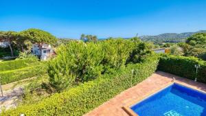 an overhead view of a swimming pool in a garden at Costacabana - Villa Beyonce in Lloret de Mar
