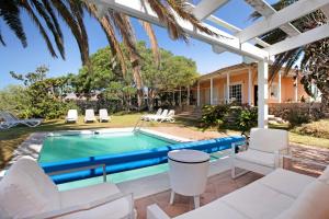 an image of a swimming pool in a house at Saint Maxime in Adeje