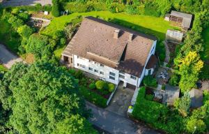 an overhead view of a large house with a roof at Ferienwohnung an der Volme in Meinerzhagen