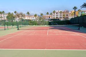 a tennis court in front of a resort at Sea Views Centro Internacional A99 in Torrox