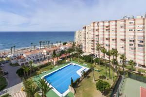an aerial view of a resort with a swimming pool and the ocean at Sea Views Centro Internacional A99 in Torrox