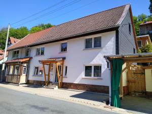 a house being remodeled with a garage at Ferienwohnung Stell in Altenbrak