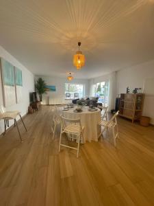 a large living room with a table and chairs at Villa Gracia in Mijas