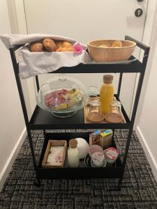 a shelf with food and other food items on it at Gh Alte Post - Top 4 Commodore in Gmünd in Kärnten