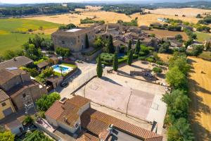 an aerial view of a village with a building at Casa Vermella in Orriols