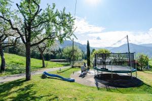 a park with a playground with a swing at Vordersbergerhof in Hausach