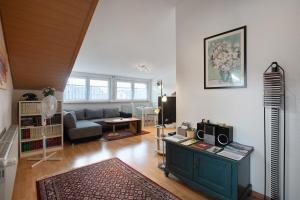 a living room with a couch and a table at Ferienwohnung Thelen in Wallbach