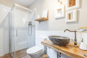 a bathroom with a sink and a shower at Can Tosca in Jávea +19 photos