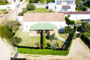 an aerial view of a house with a green roof at Casas Pepe 7 Bungalow in Los Caños de Meca