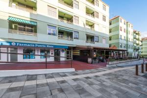 an empty street in front of a building at Brisa de mar in Puerto Naos