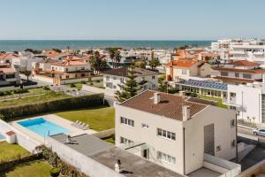 a view from the roof of a house with a pool at Viana Beach Surf House in Viana do Castelo