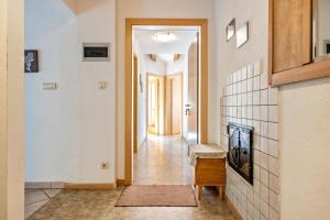 a hallway of a home with a hallway at Glocklechnhof Sternenhimmel in Cadipietra