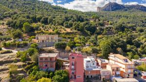 an aerial view of a small town in the mountains at Casa Cuccureddu in Jerzu