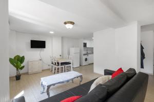 a living room with a couch and a table at Wonderful loft centre Manresa in Manresa