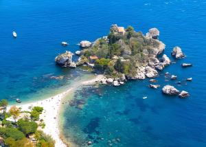an aerial view of a small island in the ocean at MSuite Etna Sicily in Macchia